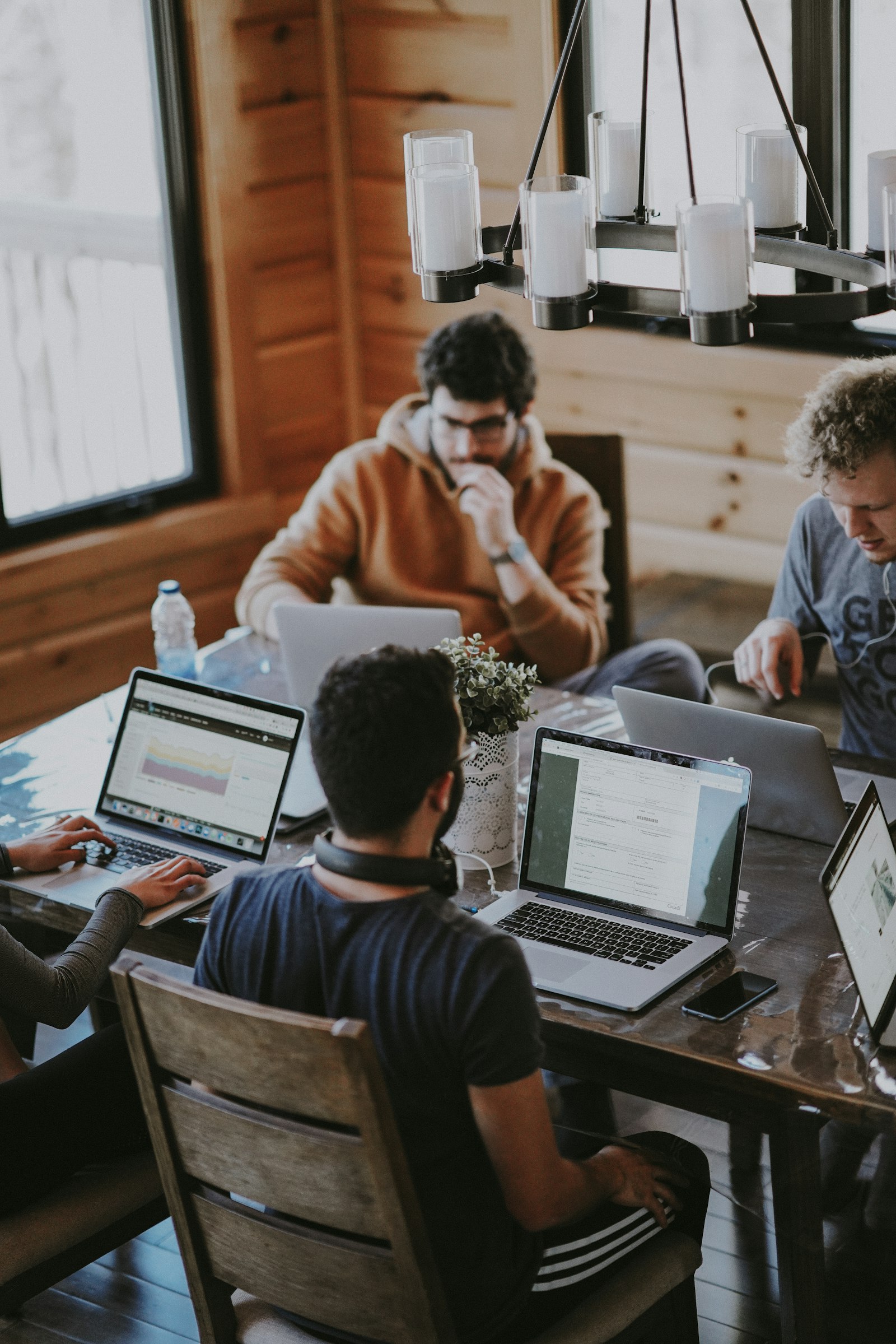 Small operations team in discussion — placeholder, replace with NZ HR InOne staff